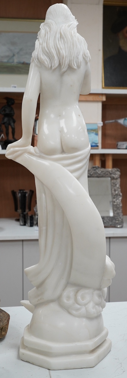 A 20th century large carved marble figure of a lady, 81cm. Condition - good